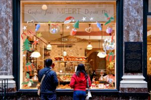 People looking in a shop window